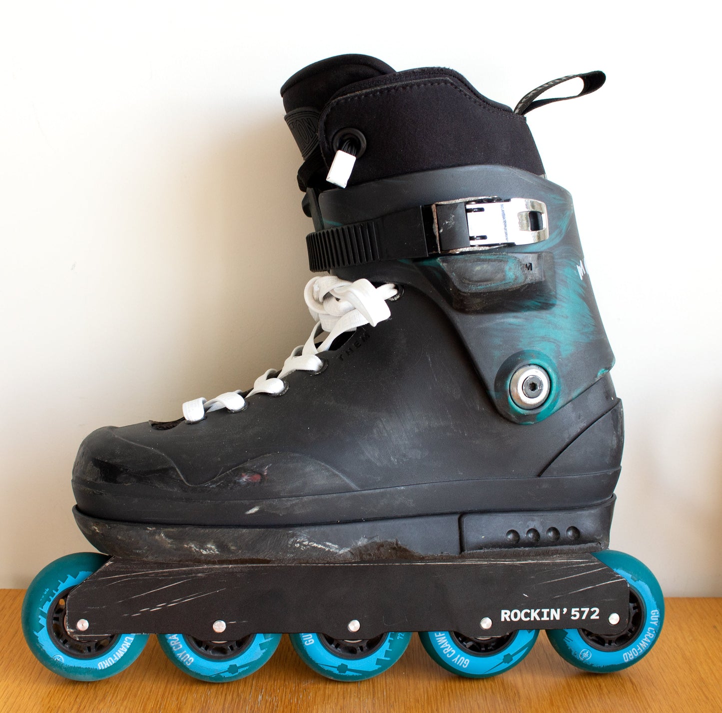 Them 909 Moopi Aggressive inline Skate with Stealth White Laced Laces.